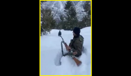 With smile on face, Indian Army jawan performs duty in sub-zero temperature; wades through waist-deep snow [WATCH] 