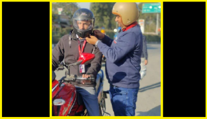 Watch PICS: Man offers helmet to Dehradun student shivering in teeth-tethering cold; internet showers praise