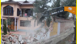J&K: Boundary wall of Hizbul Mujahideen terrorist chief Amir Khan's house in Pahalgam razed