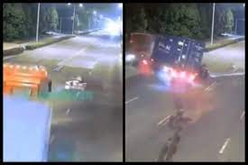 Man makes narrow escape after almost colliding with speeding truck; watch chilling video