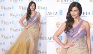 Catherine Zeta-Jones,53, stuns in sheer purple beaded gown at EE British Academy Film Awards