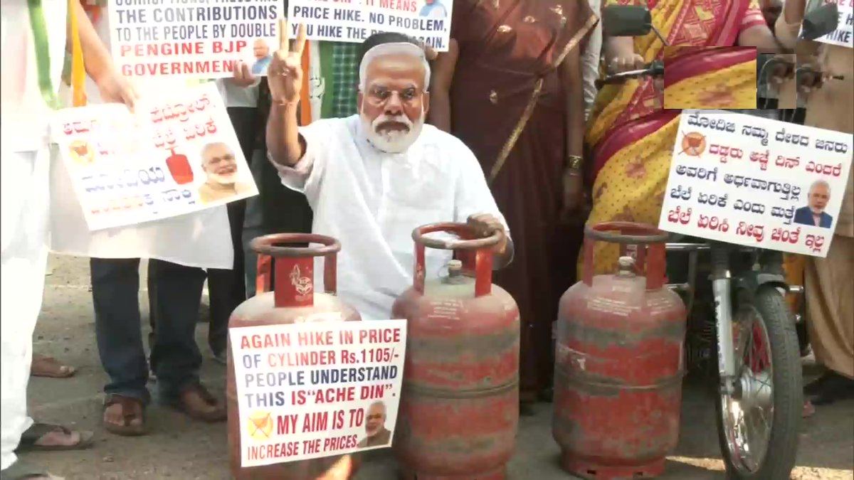 Modi Masks and Empty Cylinders: Congress protests against LPG price hike in Bengaluru