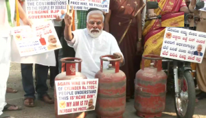 Modi Masks and Empty Cylinders: Congress protests against LPG price hike in Bengaluru