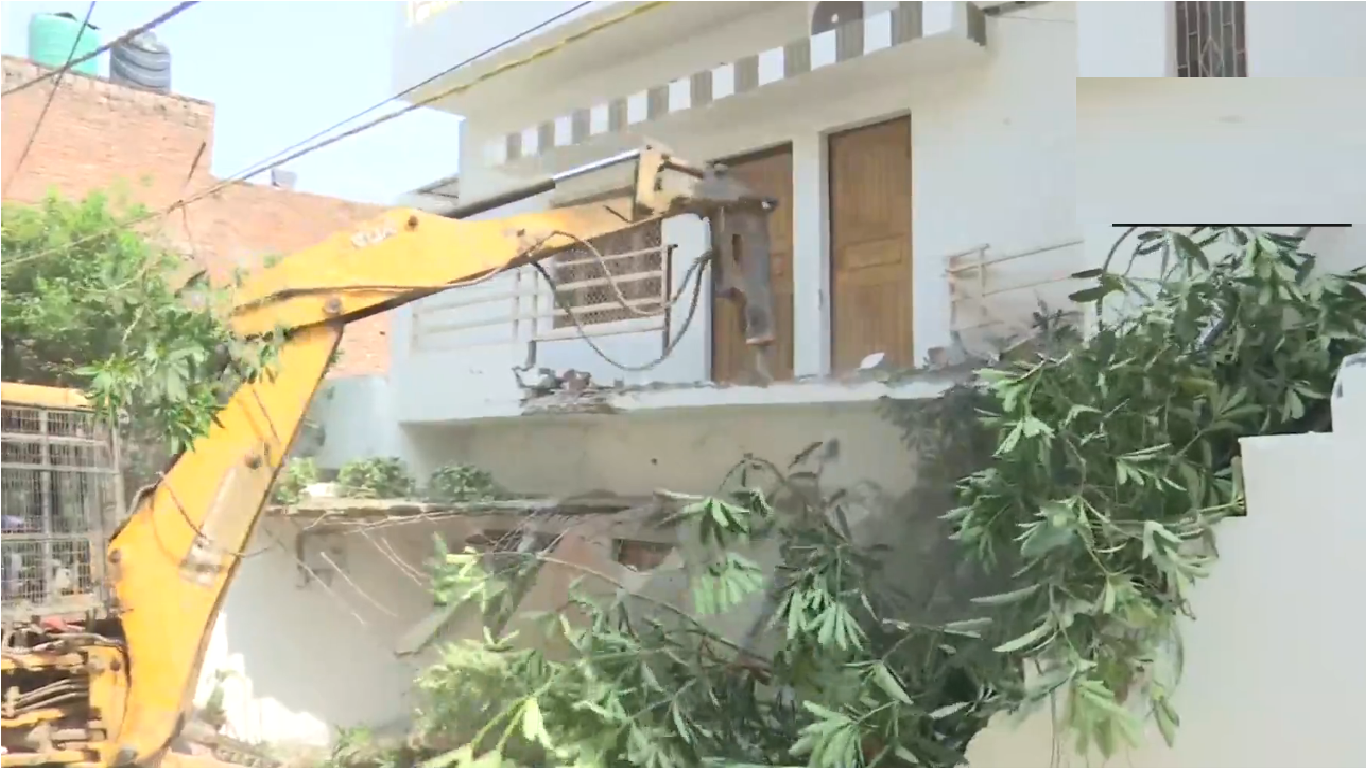 Umesh Pal Murder: Watch CM Yogi’s bulldozer demolishes Atiq Ahmad's aid house