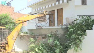 Umesh Pal Murder: Watch CM Yogi’s bulldozer demolishes Atiq Ahmad's aid house