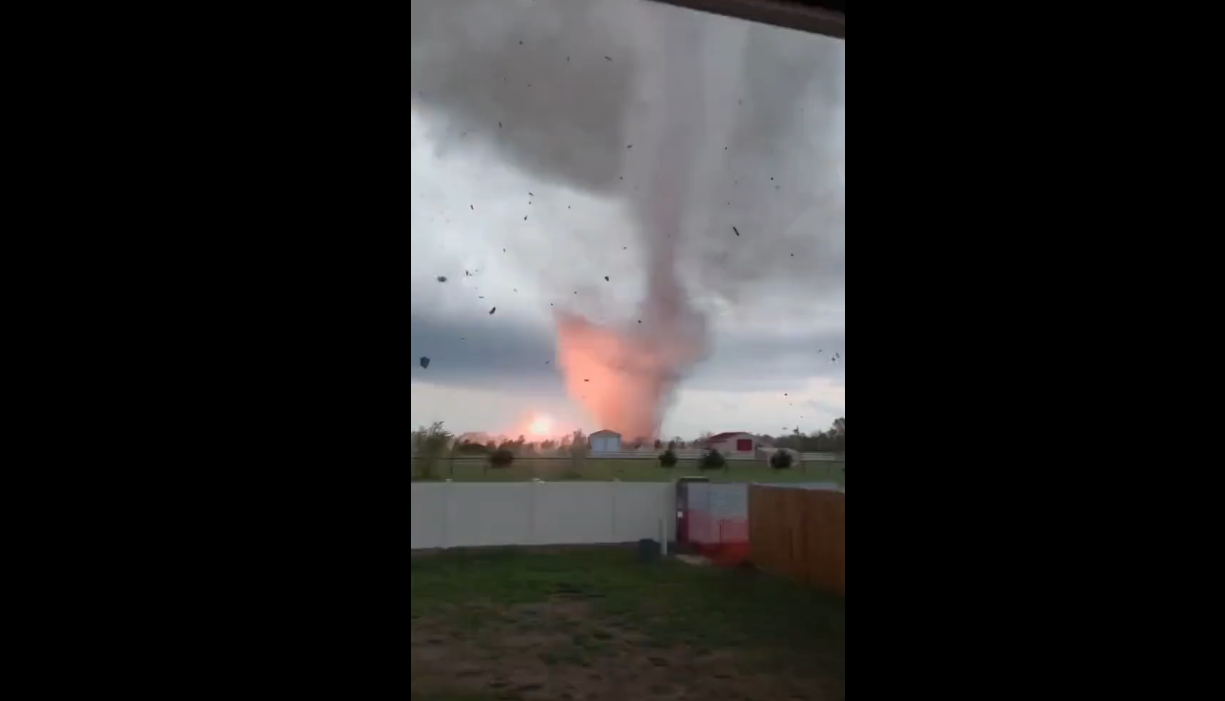 Scary: Watch man continues to film furious tornado until it comes under house premises
