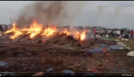 Watch: Unidentified men set 50 quintal red chillies on fire in Andhra Pradesh village