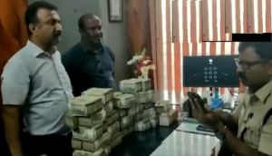 Karnataka Polls: Watch Rs 1 crore in cash seized from Autorickshaw in Bengaluru