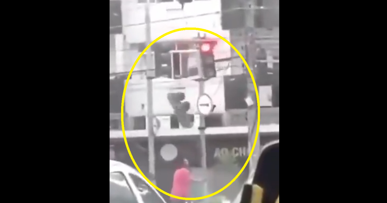Watch: Man gets instant Karma for shaking traffic lights