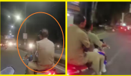 ‘Helmet Kaha Hai Bhaiya’: Watch mother-daughter chases cops riding bike without helmet