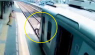 Watch: Man tries to cross railway tracks and train arrives… what happens next?