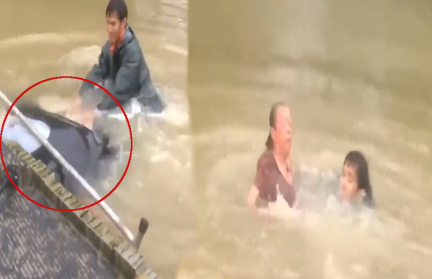 Heart-Stopping Rescue Caught on Camera: Heroic man rescues woman, her dog from sinking car