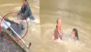 Heart-Stopping Rescue Caught on Camera: Heroic man rescues woman, her dog from sinking car