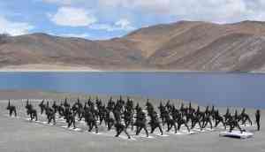 Indian Army personnel perform Yoga at Ladakh's Pangong Tso Lake