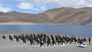 Indian Army personnel perform Yoga at Ladakh's Pangong Tso Lake