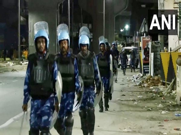 Haryana violence: Rapid Action Force personnel hold flag march in Gurugram