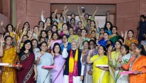 Women members chant PM Modi’s name, present bouquet to him after historic passage of women’s quota Bill in Parliament