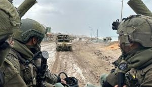 Israel strikes Hamas positions in refugee camp, Hezbollah facilities