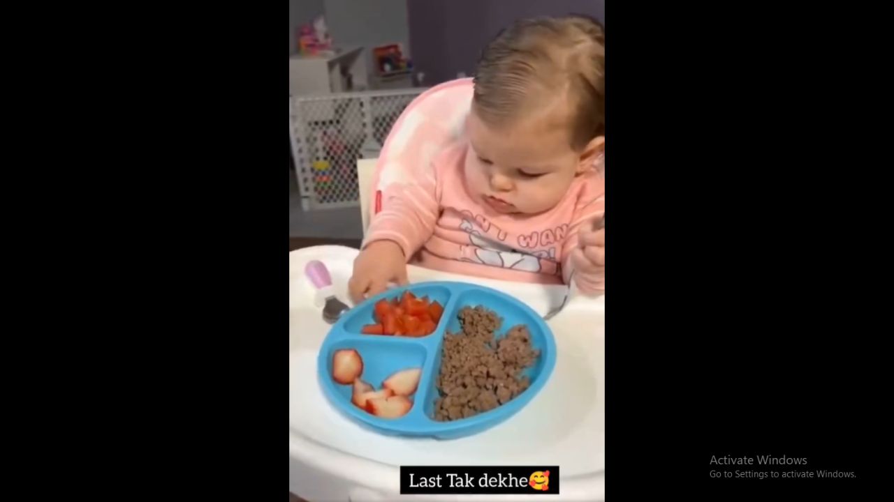 Baby's Spoon Success: Cute Video Shows Little One Never Giving Up!