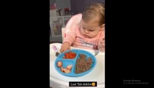 Baby's Spoon Success: Cute Video Shows Little One Never Giving Up!