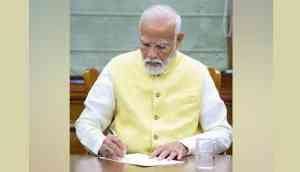 First Day In Office: PM Modi signs file on Kisan Welfare