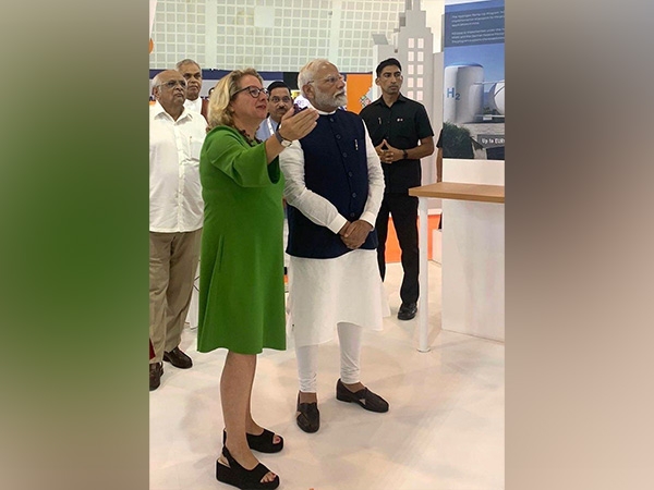 German Development Minister greets PM Modi at 4th Global Renewable Energy Investor's Meet