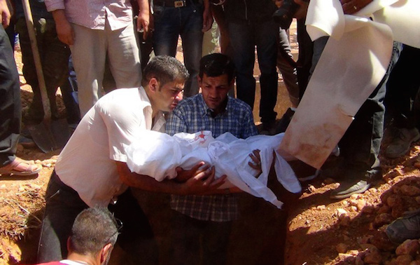 Aylan Kurdi Burial AFP PHOTO / ANHA