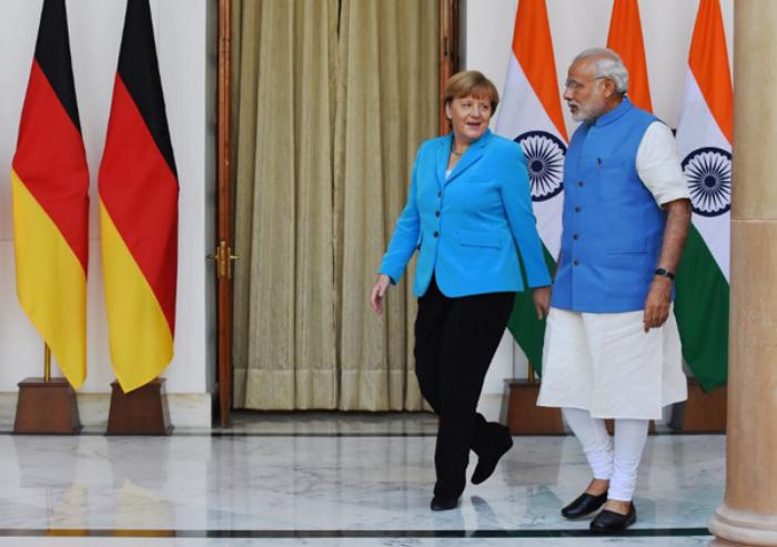 Merkel and Modi/wire/AFP PHOTO / ROBERTO SCHMIDT