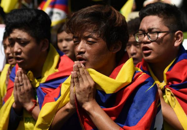 Photo: Tibetan Youth Protest(AFP PHOTO / SAJJAD HUSSAIN)