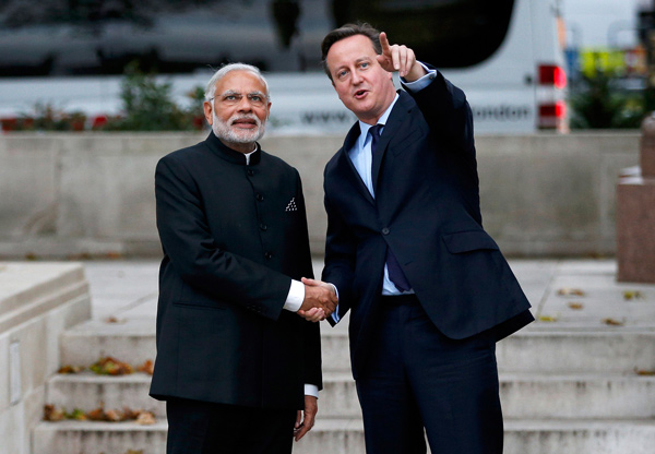 Modi with Cameron/wire/Peter Nicolls Reuters
