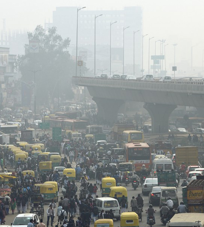 Photo: Money Sharma/AFP- Delhi traffic for Live lead