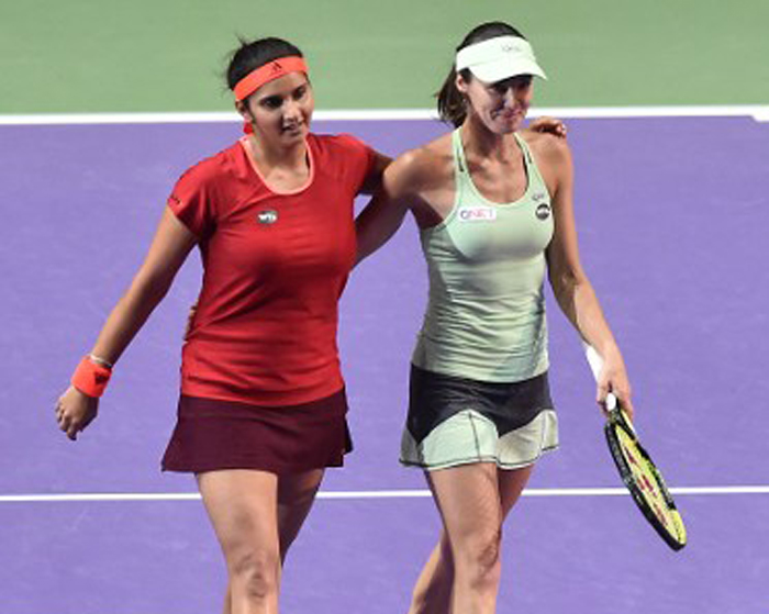 Sania Mirza and Martina Hingis_Mohd Fyrol/AFP