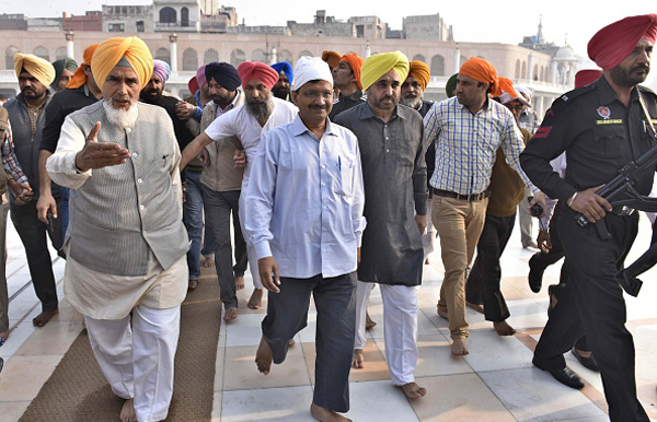 Delhi CM Arvind Kejriwal, MP Bhagwant Mann, AAP leader Sucha Singh Chhotepur at the Golden Temple on