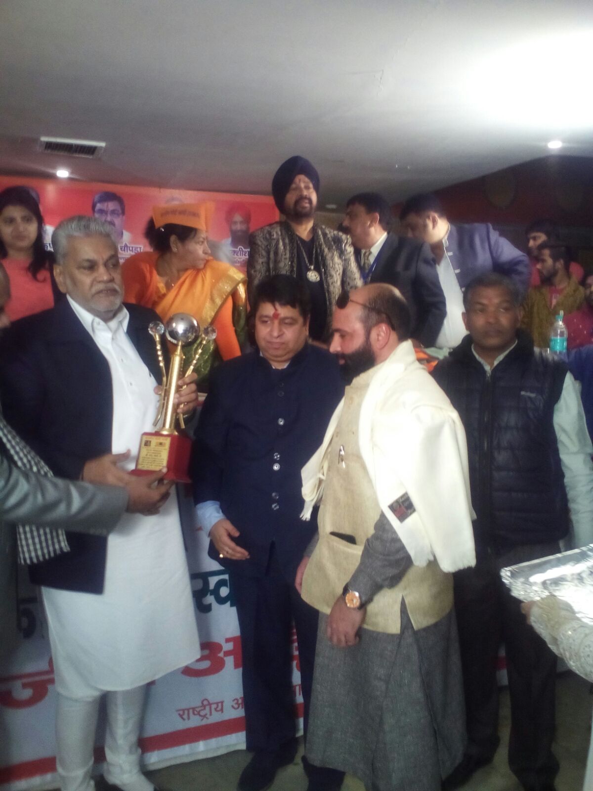 Manzoor Ahmad Khan taking award
