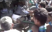 Video: Angry mob thrashes policeman in Vadodara; sets his bike on fire 