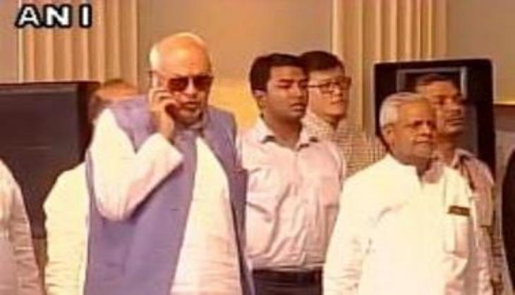 Farooq Abdullah draws criticism for using phone during national anthem 