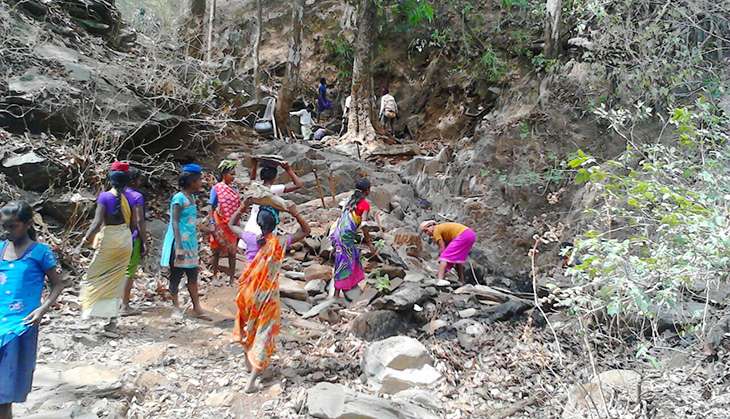 No water: tribals in a Chhattisgarh village take their kitchen to the river 