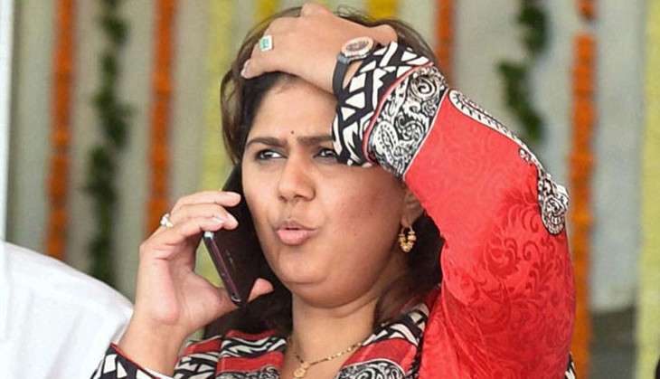 Pankaja Munde heard 'threatening' a priest in audio clip 