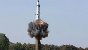 North Korea test-fires ballistic missile which flies over Japan