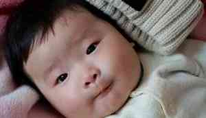 A Chinese baby born four-year after his parents died in a car accident