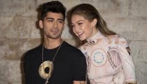 Watch Video: Zayn Malik makes out with Gigi Hadid's lookalike Sofia Jamora in the video “Let Me” 