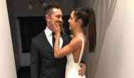 Australian fitness trainer Kayla Itsines shared engagement photos with Tobi Pearce on Instagram