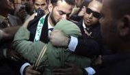 Journalist who was jailed for throwing shoe at George Bush is now running for parliament seat in Iraq