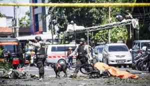 CCTV footage reveals Indonesia suicide bombing carried out by family including 8-year-old girl