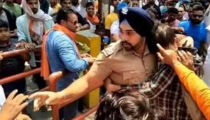 Uttarakhand's Sikh police officer, Gagandeep saves Muslim boy from being thrashed by Hindutva goons at temple; video goes viral