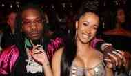  Offset kiss Cardi B's baby bump in her semi-naked pregnancy photoshoot for Rolling Stone cover