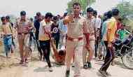 Hapur Lynching: UP cops say 'sorry' after viral photo shows Muslim man being beaten up and dragged in personnel' presence