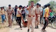 Hapur Lynching: UP cops say 'sorry' after viral photo shows Muslim man being beaten up and dragged in personnel' presence