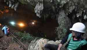 As the search for 12 young soccer players lost in a cave hits day 5, Thailand holds its breath