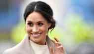 Meghan Markle looks classy in white shirt and black capri pants at the Audi Polo Challenge with Prince Harry